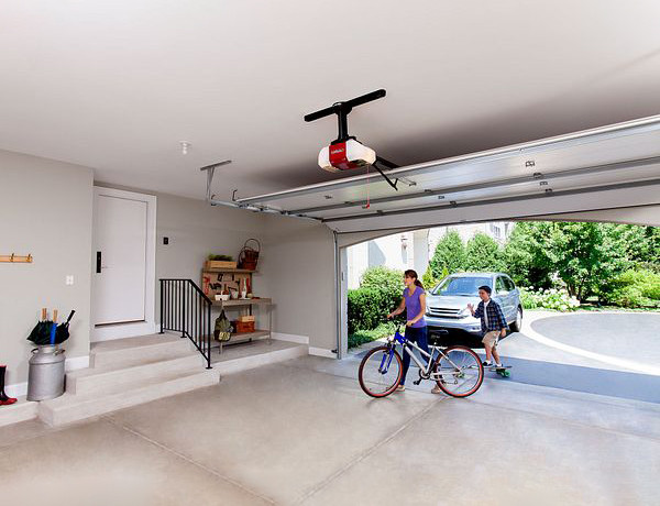 woman and child walking through their garage
