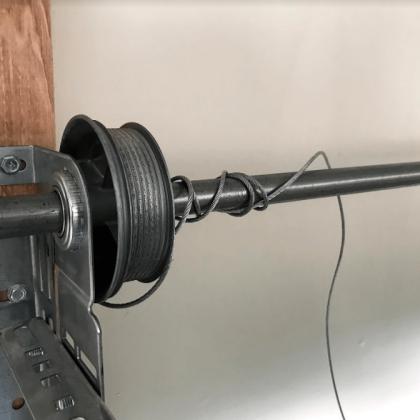 garage door cable on a drum