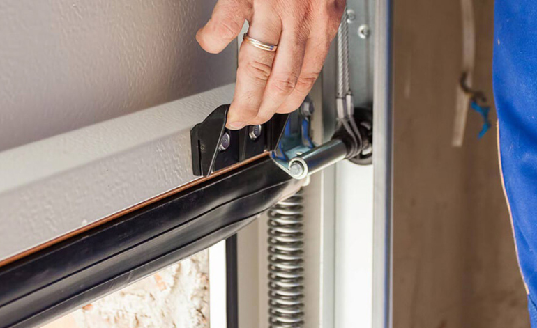 manually opening a garage door by-hand