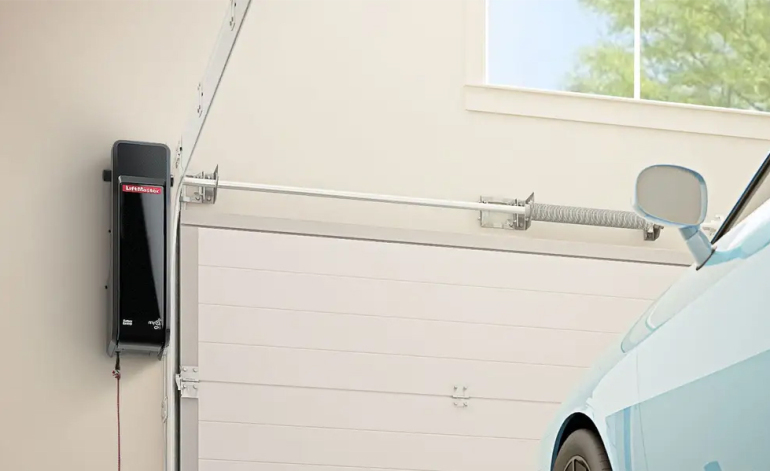 blue car in front of a garage door