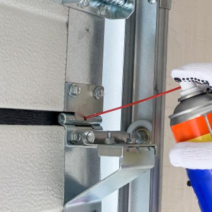 lubricating a garage door