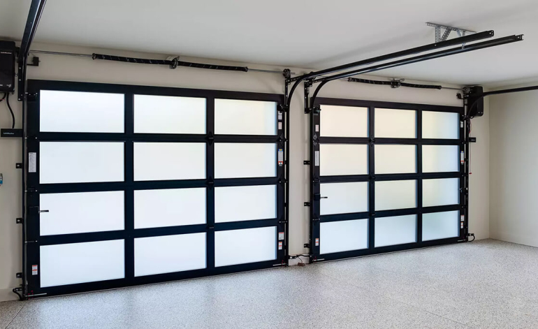 interior of a garage with a black garage door
