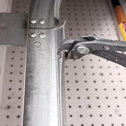 bent garage door track